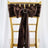 Brown satin chair sash with bow and embellishment for events and weddings.
