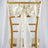 Gold chiavari chair with elegant ivory satin bow and rhinestone detail.
