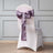 Elegant white chair with a lavender satin bow on the back.