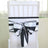 Black and white chair sash bow on a white chair.