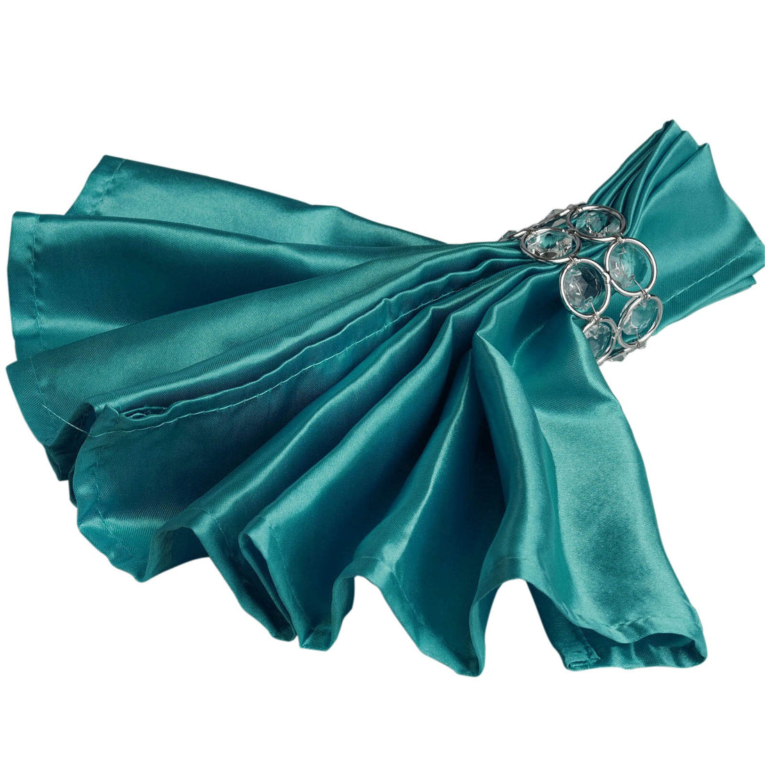 Teal satin napkin with silver ring holder, elegantly styled.