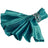 Teal satin napkin with silver ring holder, elegantly styled.