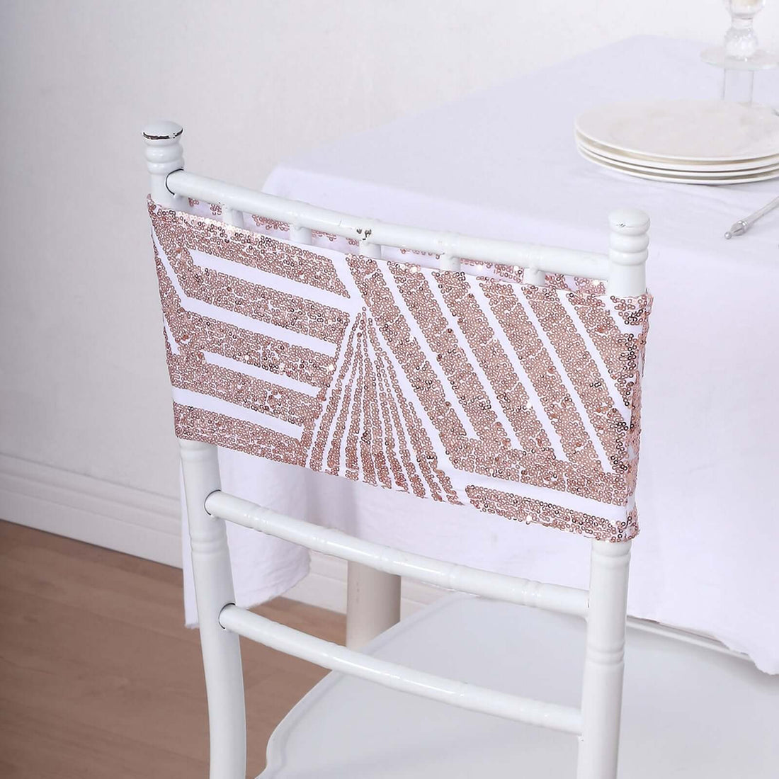 Decorative chair back cover with geometric design in pink and white