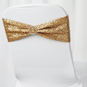 Gold sequin chair sash with a circular rhinestone buckle.