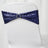 Navy sequin chair sash with rhinestone buckle on white chair