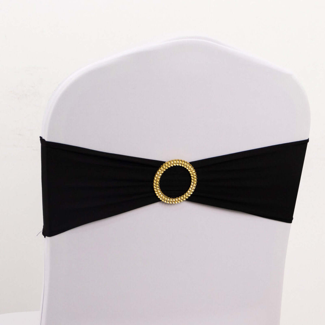 Black chair sash with gold embellishment for elegant decor