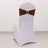 White chair cover with brown sash and decorative circle detail