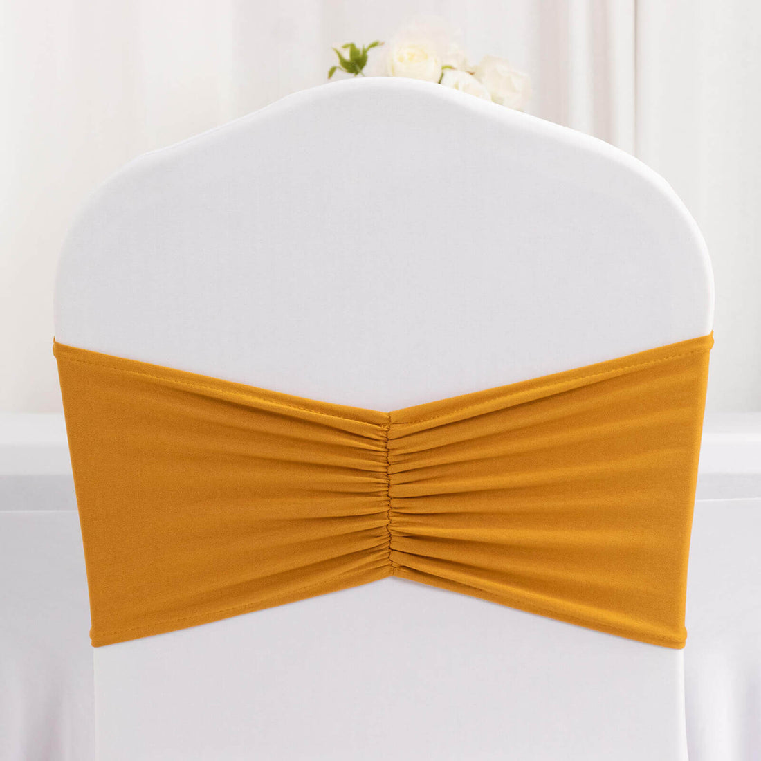 Yellow chair sash with gathered design for elegant event decor