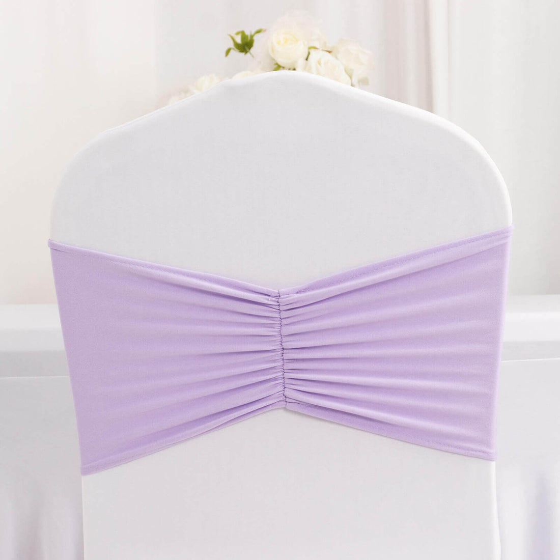 Lilac chair cover with gathered fabric detail for elegant event decor