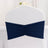 Navy blue chair cover with ruched detail for elegant event decor