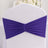 Purple chair cover sash with pleated design for event decor.