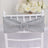 Silver glitter chair sash with rhinestone buckle on a white chiavari chair.