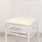 White chiavari chair with a cream cushion