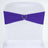 Purple chair sash with heart-shaped rhinestone embellishment
