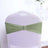Green chair cover with decorative buckle for elegant events