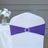 Purple chair cover with rhinestone accent on a white chair.