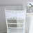 White chair cover with rhinestone embellishment on a white background