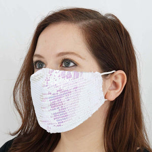 Sequin face mask worn by a model against a plain background.