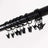 Black curtain clips hanging on a rod