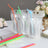 Clear reusable drink pouches with colorful straws in a stylish setting.