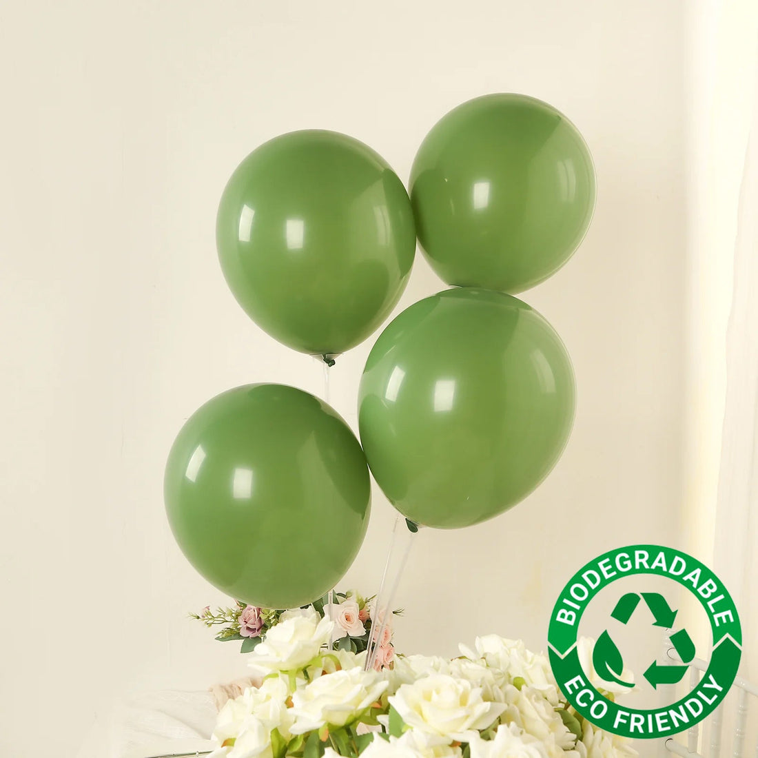 Dusty sage green latex balloons for a baby shower balloon garland