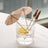 Cocktail glass with decorative paper umbrellas inside