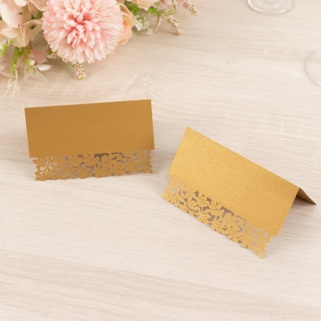 Gold lace place cards for elegant events and weddings.