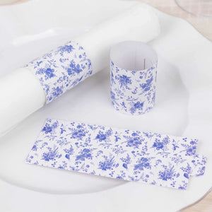 Floral print napkin rings and wrap on a white plate.