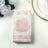 Pink floral patterned napkins on a white background.