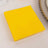 Yellow napkin on a table setting.