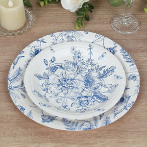 Floral design paper plates stacked on a wooden table.