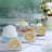 Handmade desserts in clear packaging with "handmade with love" labels.