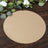 Brown circular paper on a wooden surface with greenery around it.