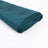 Teal fabric roll on a white background