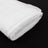 Rolled white fabric on a black background.
