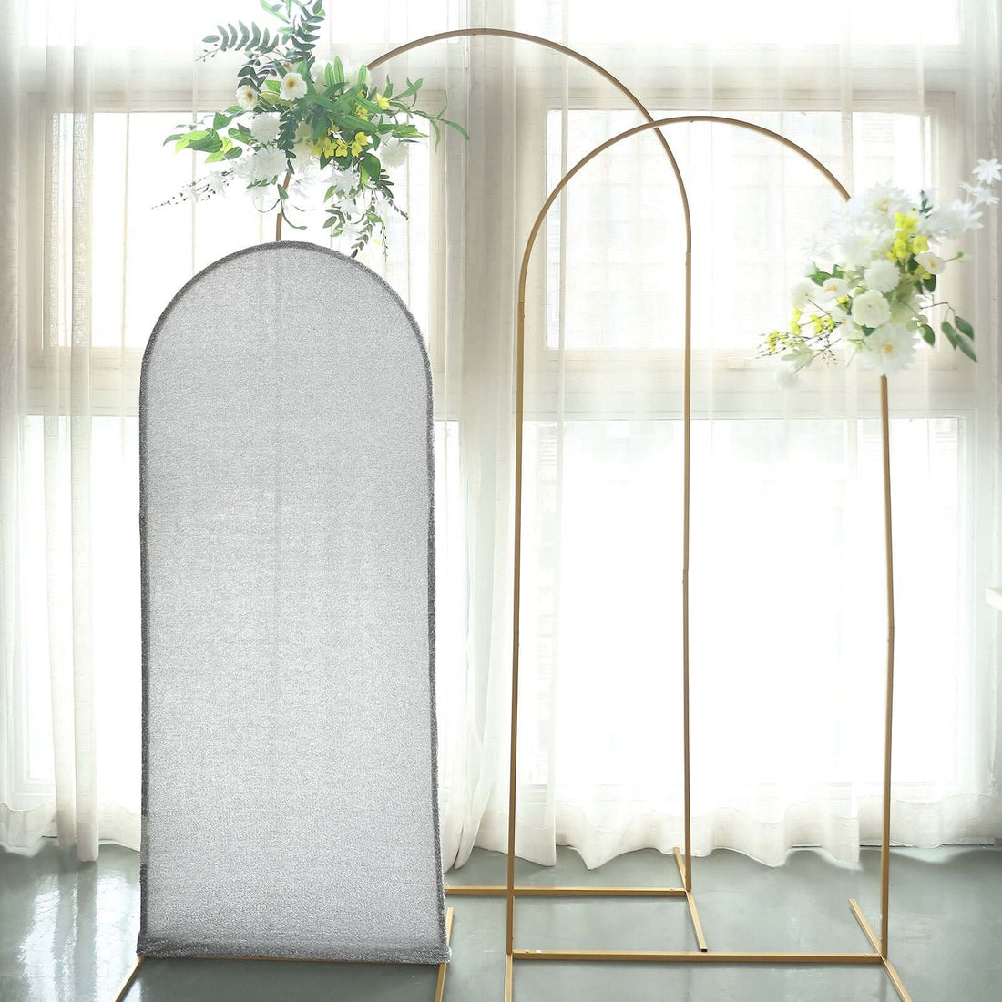 Decorative arch with flowers for events or photo backdrops.