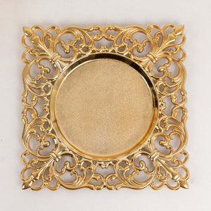 Gold decorative plate with intricate floral design and a smooth center.