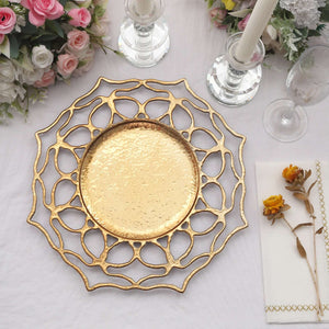 Elegant gold decorative plate with intricate design and floral arrangement.