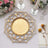 Elegant gold decorative plate with intricate design and floral arrangement.