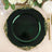 Elegant green charger plate with ornate gold trim on a dining table setting.
