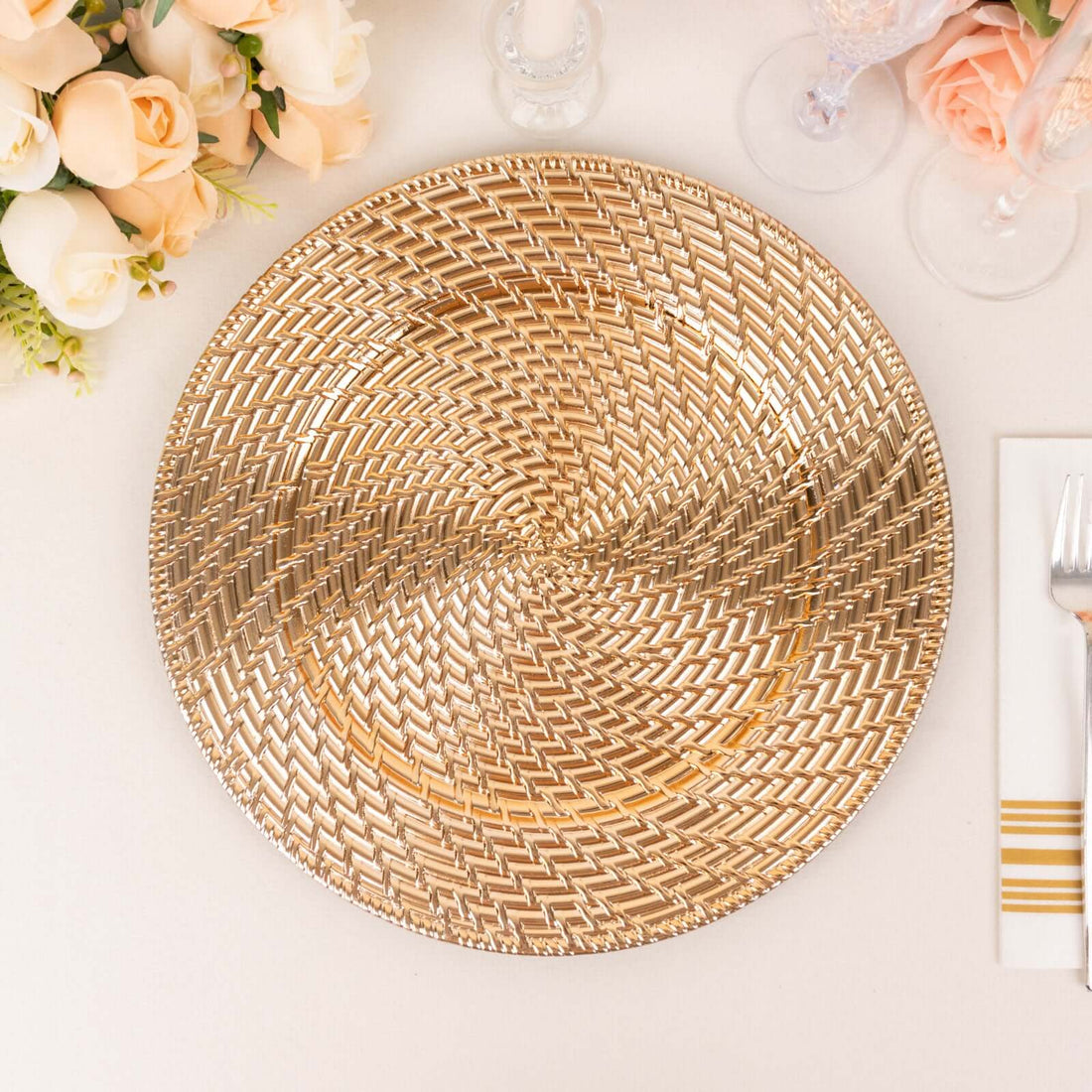 Gold woven charger plate for elegant table settings.