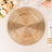 Gold woven charger plate for elegant table settings.