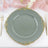 Elegant gray dinner plate with gold embellishments on a soft fabric backdrop.