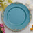 Turquoise decorative plate with gold intricate border