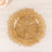Amber glass decorative plate with ruffled edges.