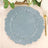 Decorative blue plate with textured design on a table setting.