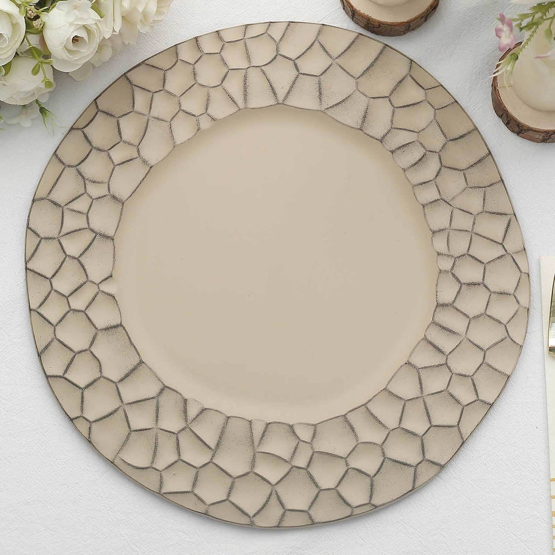 Textured round plate with a unique cracked design.