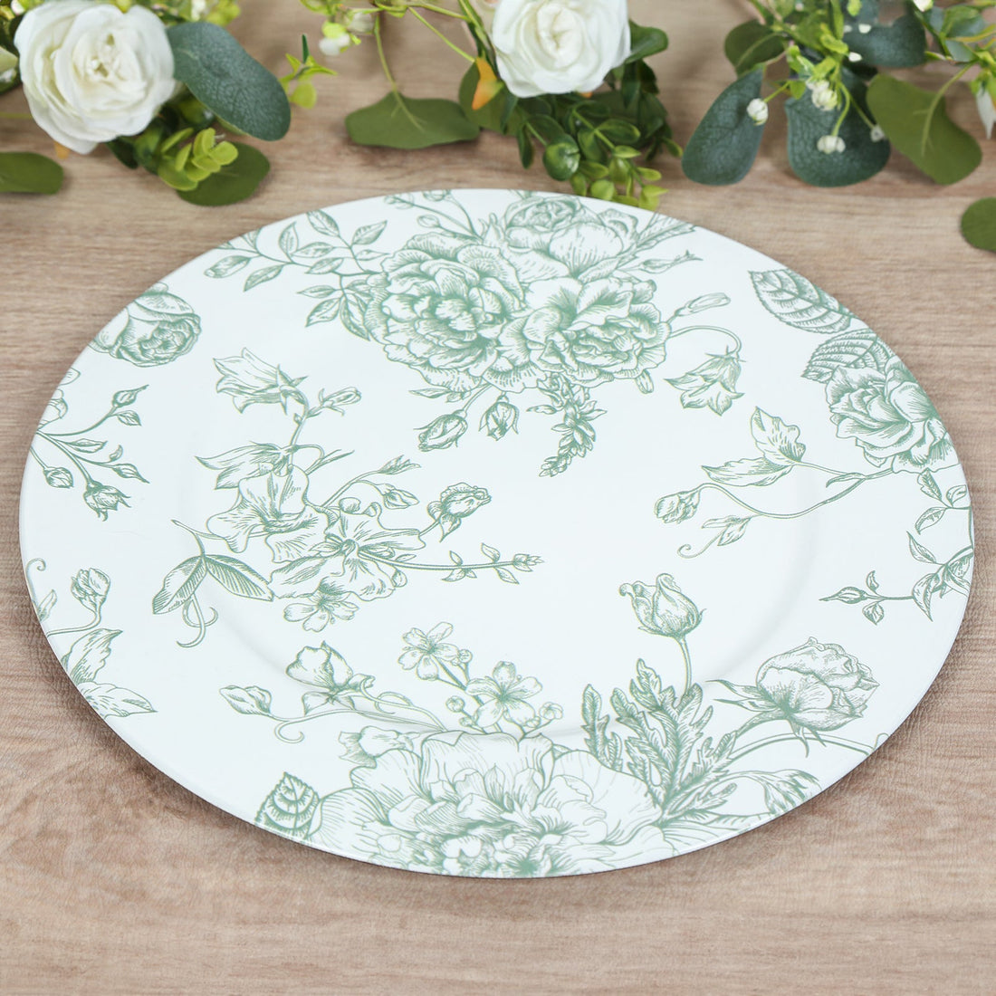 Floral design plate with green illustrations on a white background.