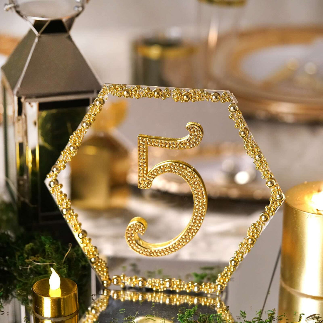 Gold hexagon table number 5 with rhinestones for elegant events