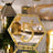 Gold hexagon table number 5 with rhinestones for elegant events